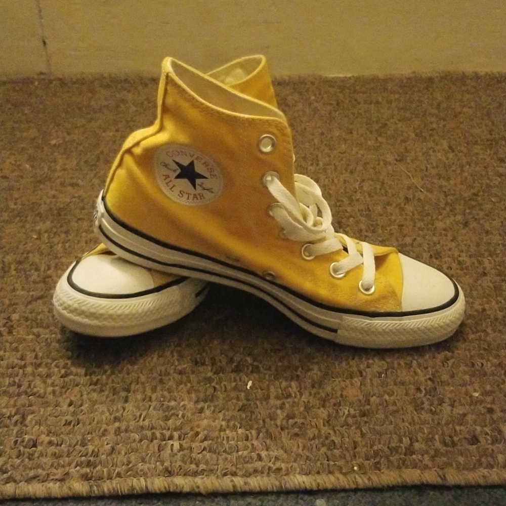 Yellow Converse hi-tops